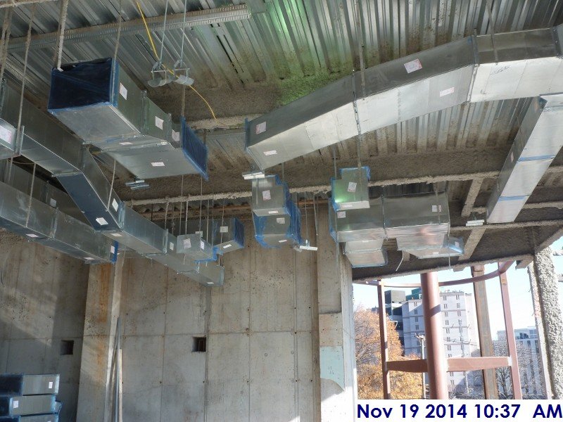 Continued installing duct work at the 2nd floor Facing East